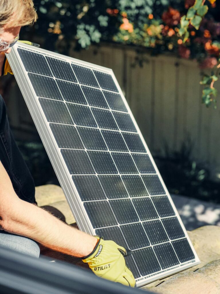 Residential rooftop with solar panels installed, capturing sunlight to generate clean energy for the home.